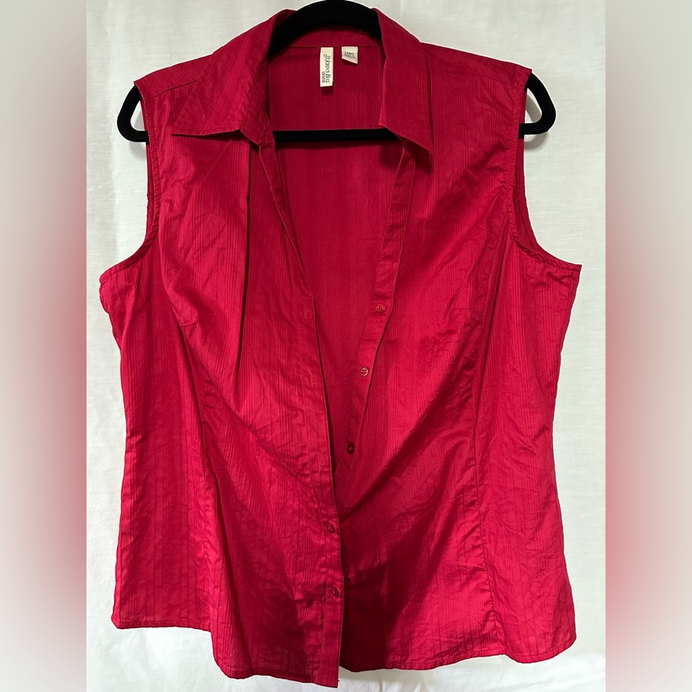 Lightly worn. Women’s large blouse. Red button down.
